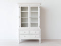 Vitrinas de madera manufacturada y vidrio 105x45x195 cm blanco con 2 puertas y 3 cajones para salón y comedor estilo clásico